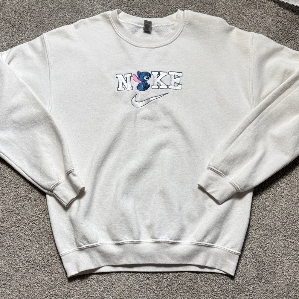 Stitch White Crewneck Sweatshirt with Blue and Pink Embroidered Nike Logo